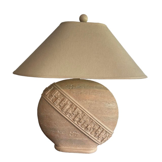 This is a pair of Mactan stone-style plaster round table lamps, designed with a harmonious balance of smooth and rough-...
