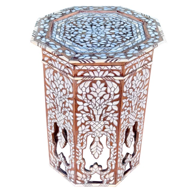 An exquisite mid-19th century octagonal side table from Damascus, representing one of the finest traditions of Syrian...