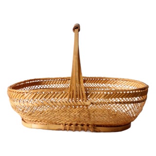 Vintage 1970s Rattan Basket With Handle For Sale