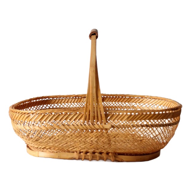 Vintage 1970s Rattan Basket With Handle For Sale