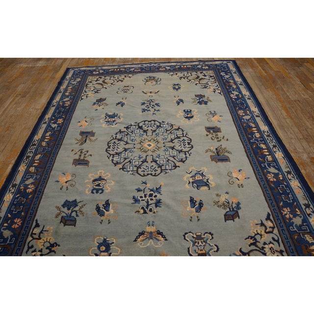 Hand Knotted Pile Antique Blue 1890s Wool Rectangle Rug, Circa Date: 1890s. This exquisite example of Chinese textile...