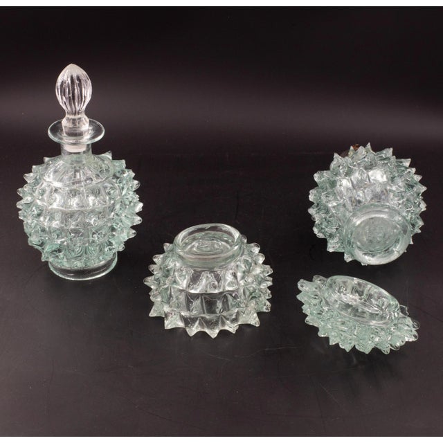 Incredible set of 3 Murano style glass vases in a rare mid-century blu acquamarina rostrato. This beautiful object was...