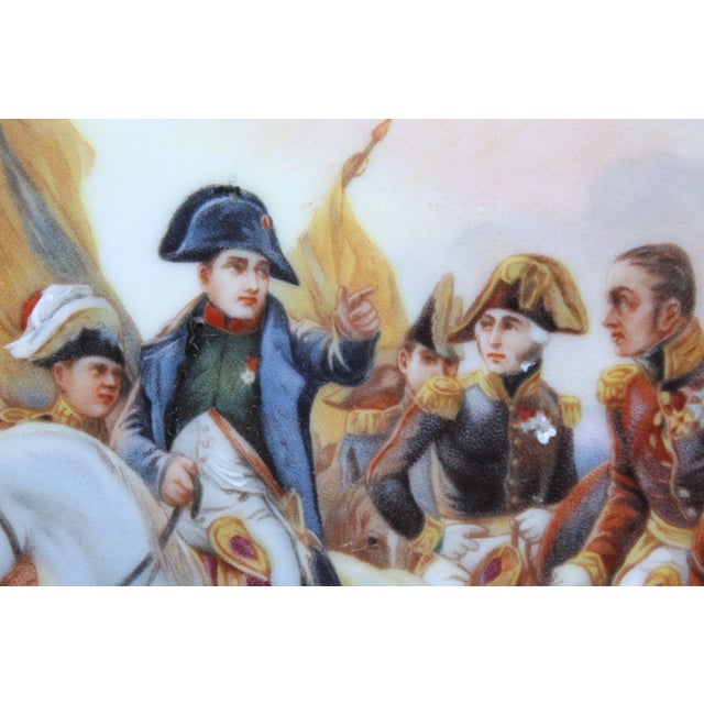 This Napoleon charger plate is 13.13/16", It is ceramic/porcelain, beautifully hand painted. There are no chips or...