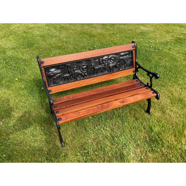 Antique children’s ‘safari animals’ themed hand painted cast iron & mahogany garden bench An enchanting and irresistable...