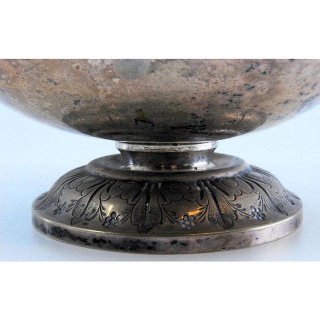 Silver Sugar Bowl Profusely Embossed with Floral Motifs, Decorated with a Knob on the Lid, in Very Good conditions....