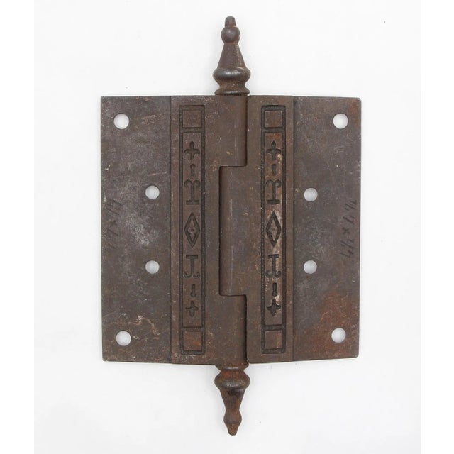 This Aesthetic style butt door hinge is made of black cast iron with steeple tips, three knuckles, and a template hole...