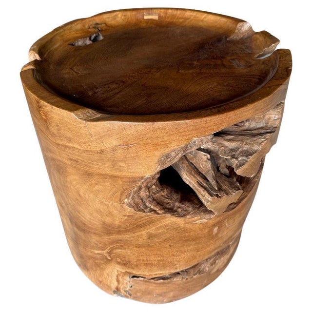 Beautiful century old teak root shaped into a side table. We hand carved the top section into a tray style and added the...