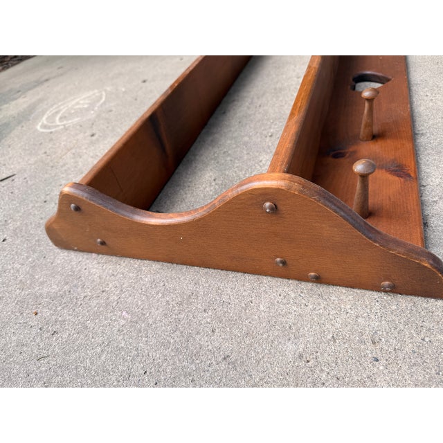 Cottage-style wood shelf with a heart and some pegs. 36.25w 20.5h 5.5d Date it was made is unknown although is it vintage...