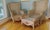 A remarkable, museum-quality three-piece suite of vintage 1980s bohemian parlor furniture. This collection includes two...