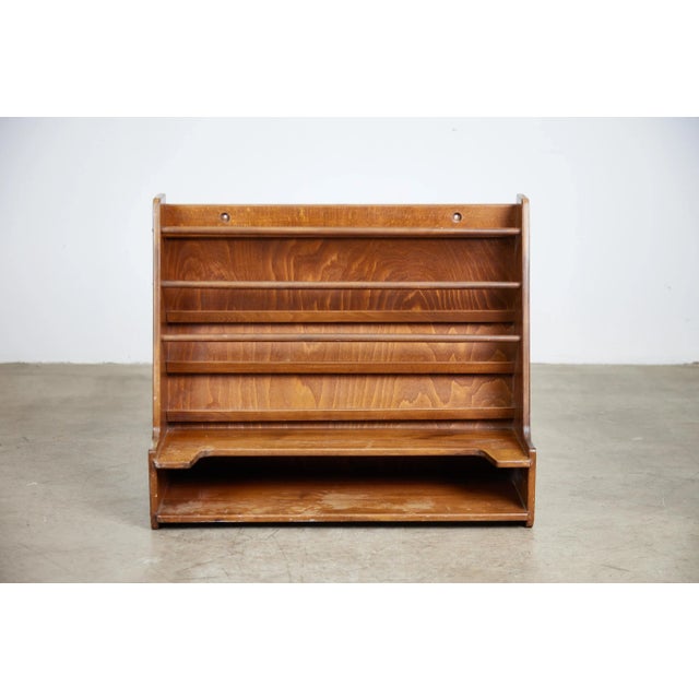 Great wall-mounted plate rack from Denmark and the mid-century Made from solid teak showing very nice patina and beautiful...