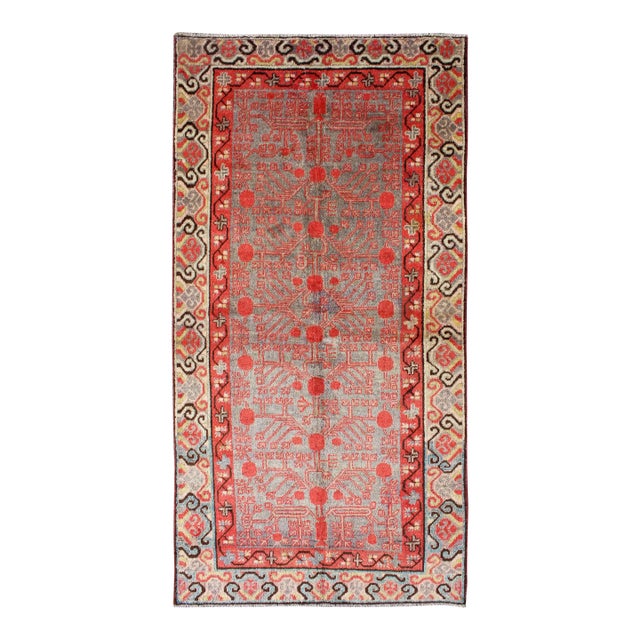 Intricate Vintage Khotan Rug With Sub-Geometric Design in Reds and Light Blue 3'10'' X 8'1'' For Sale
