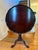 This is a magnificent tilt-top Chippendale style tea table in mahogany, with pie crust top. The table top is supported on...
