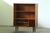 A matching pair of slim Danish teak bookcases from the 1960s, sold as a set. Their narrow proportions make them...
