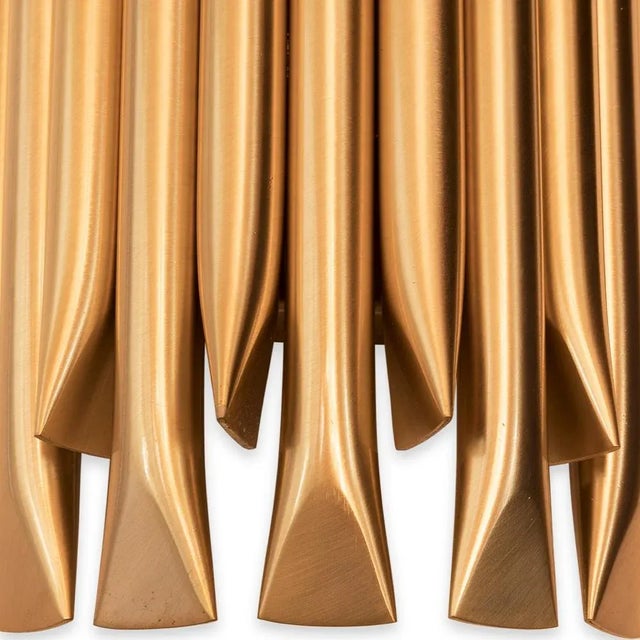 Matheny wall light has a complex and attractive geometry design of combined tubes. This unique lamp combines a mid-century...