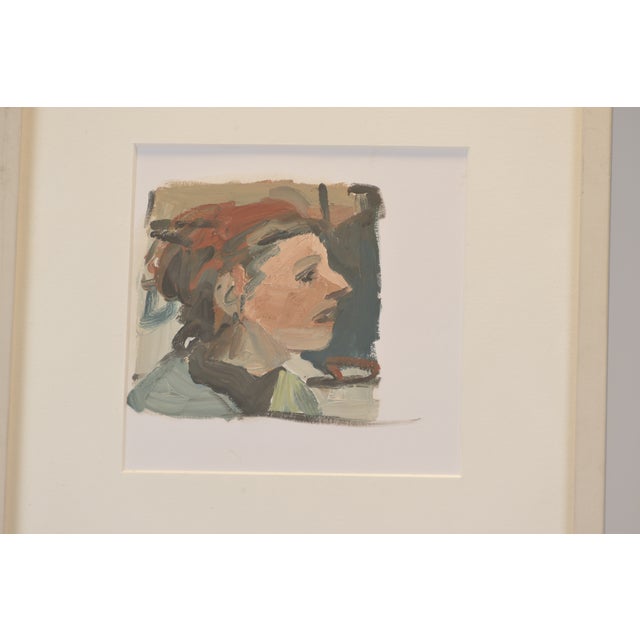 Small portrait by Jochen Pankrath, "NORA". Oil on paper, elaborately framed with a passe-partout. The subject is...