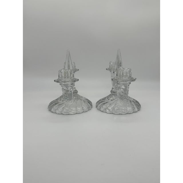 Gorgeous vintage Fostoria clear glass "Colony" pattern set of two double candlestick holders. These double armed...