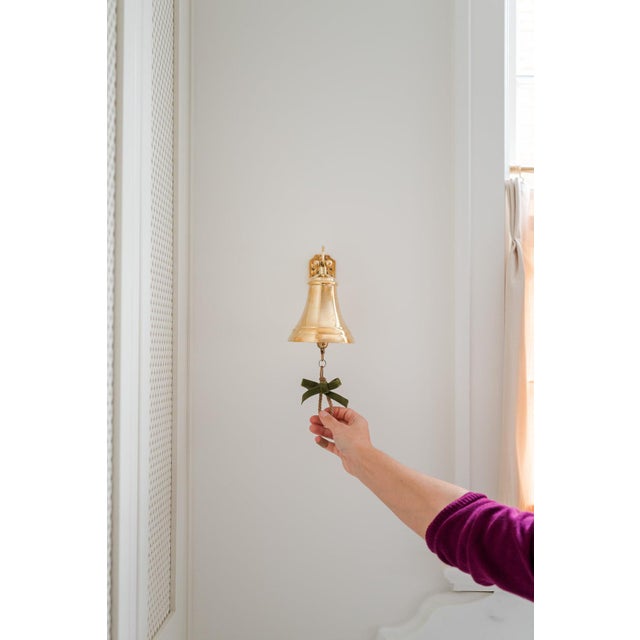 Hand-cast from solid brass, our Dinner Bell adds a touch of timeless charm to any entry or gathering space. The graceful...