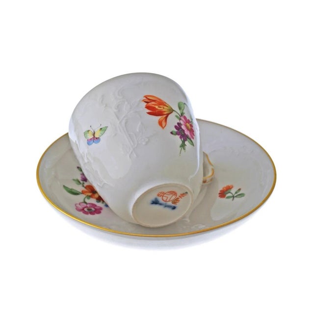 KPM Berlin Porcelain Reliefzierat Demitasse Cup and Saucer Multicolor Floral White Relief Germany. Decorated with hand-...