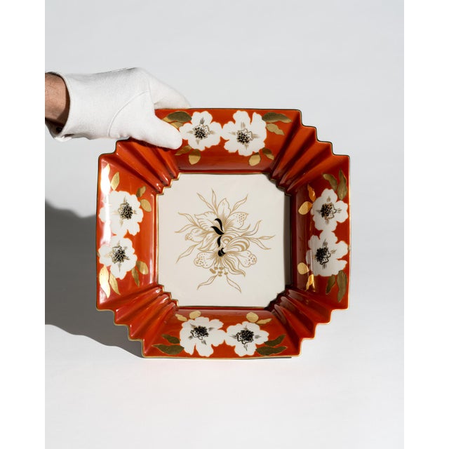 An exuberant and highly decorative porcelain centerpiece bowl by Schaubach Kunst, Germany, combining Art Deco-inspired...