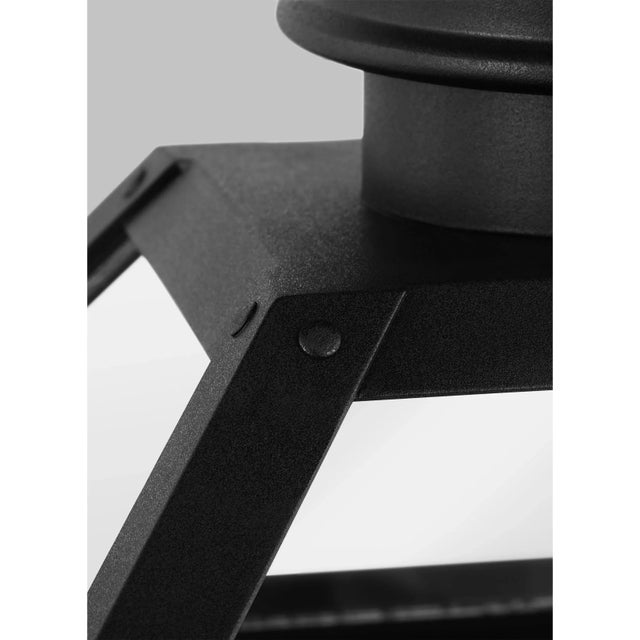 The Hyannis four light outdoor wall fixture in textured black by Chapman & Myers has a classic copper lantern profile with...