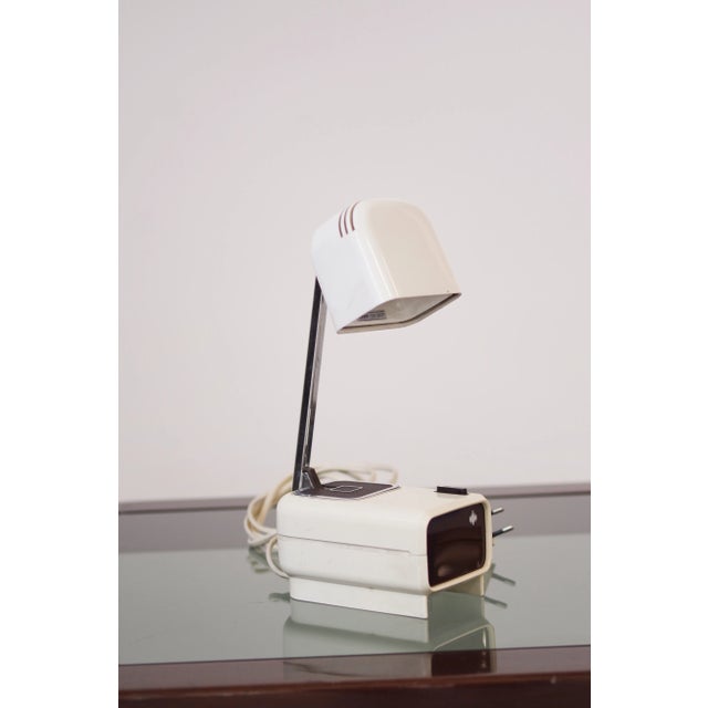 Vintage Folding Reading Lamp with Telescopic Arm and Dual Light Intensity Add a touch of vintage functionality to your...