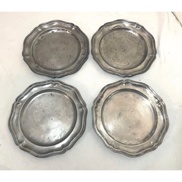 Up for sale is a rare lot of 4 antique early 18th century European pewter plates. They are forged by hand out of thick...