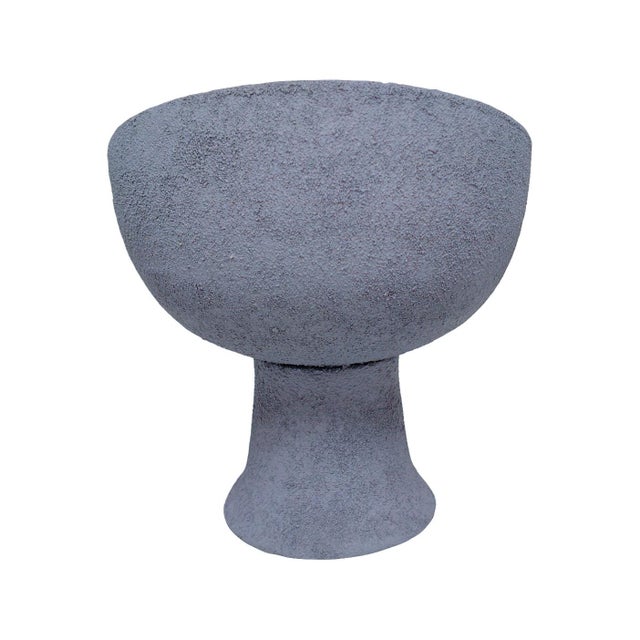 Earthy, sculptural, and effortlessly refined, this pedestal bowl brings a grounded, organic presence to any space. Crafted...