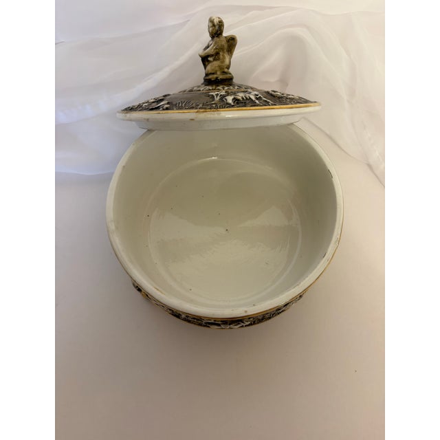 Very stunning lidded vintage style of R Capodimonte trinket box with darling scenes on the sides and top. The box shows a...