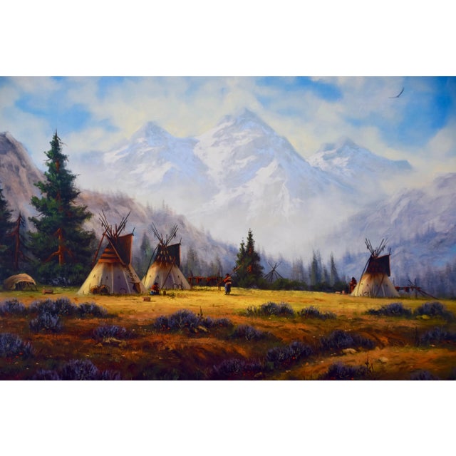This is a limited edition print from a painting by Heine Hartwig (1937- ) depicting a Native American encampment in a...