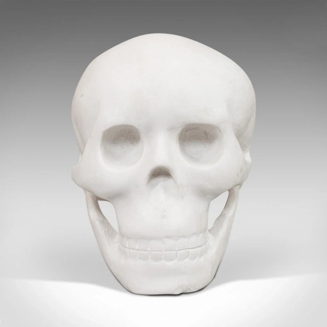 This is a vintage marble skull. An English, Bianco assoluto paperweight or ornamental study, dating to the late 20th...