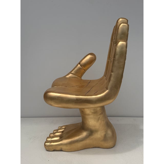 Antique gold leaf hand and foot boudoir chair in the manner of Pedro Friedeberg in cast fiberglass.