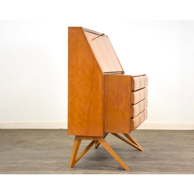 A very rare mid century modern birch secretary desk with sculpted legs and four drawers. Made in Italy. Circa 1950’s....
