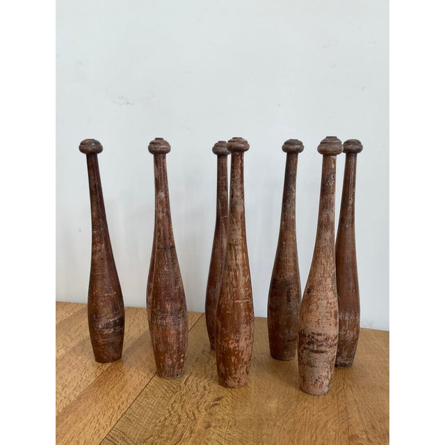 These were traditionally hand-turned, utilitarian training pieces made by local craftspeople or gymnasiums. They...