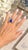 A sculptural vintage American statement ring in 14K yellow gold, showcasing a vivid 5.00 carat pear-shaped lapis lazuli...