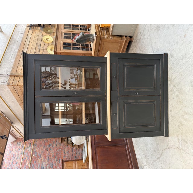 This antique poplar dresser has been fully restored. It consists of an upper section with two glass-paneled doors opening...