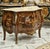Bring refined European elegance to your home with this exquisite French-inspired commode, featuring a rich brown wood...