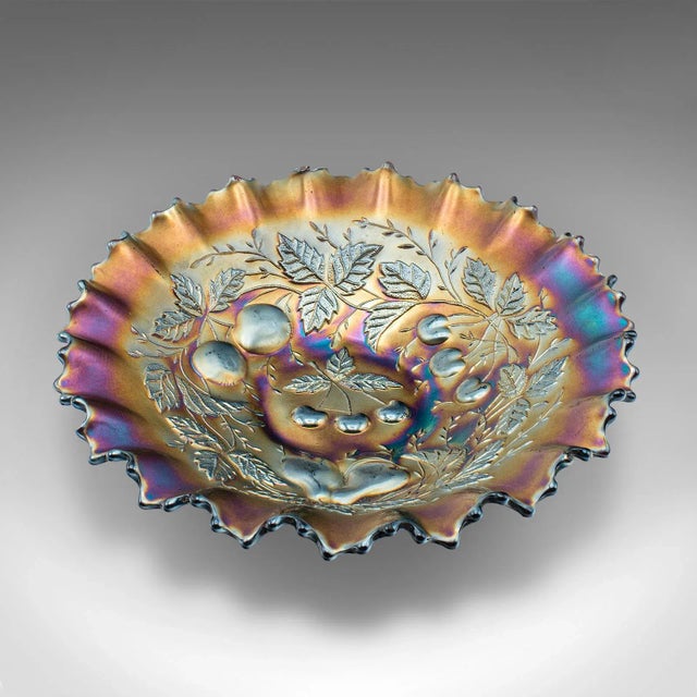 This is a vintage soft fruit dish. An English, carnival glass plate, dating to the late 20th century, circa 1970. Striking...