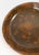 We are selling this simple 19th Century redware pie dish. This pie dish has manganese glaze with splattered spotted glaze...