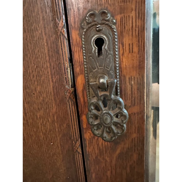 Early 20th Century British Made Art Nouveau Wardrobe Armoire With Stunning Carved Relief Accents and Hardware For Sale - Image 4 of 12