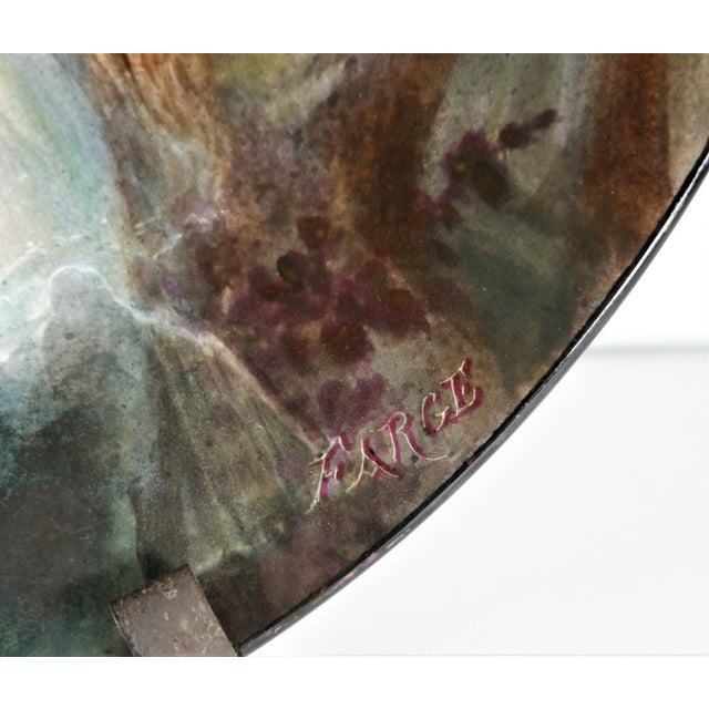 An antique 1800’s high quality hand painted French portrait plate. Woman is unknown but signed in the lower right “Farge”....