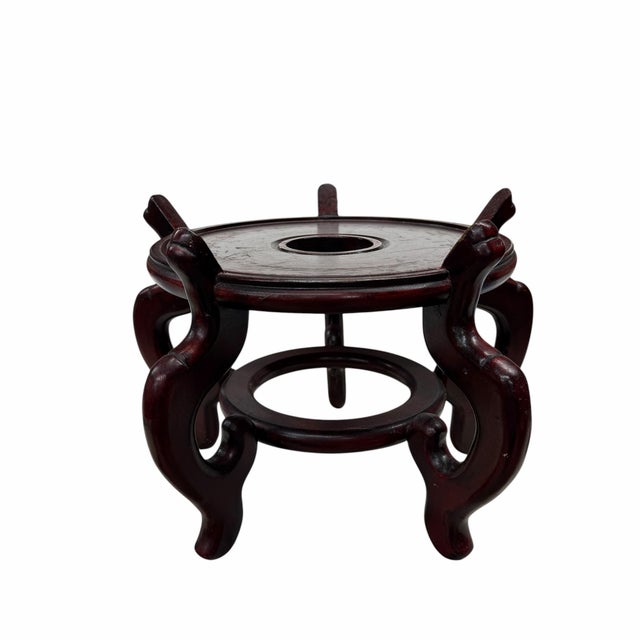 Vintage fish bowl, plant stand in mahogany finish. Measures at the widest point, 15” diameter x 20” h. Will hold a...