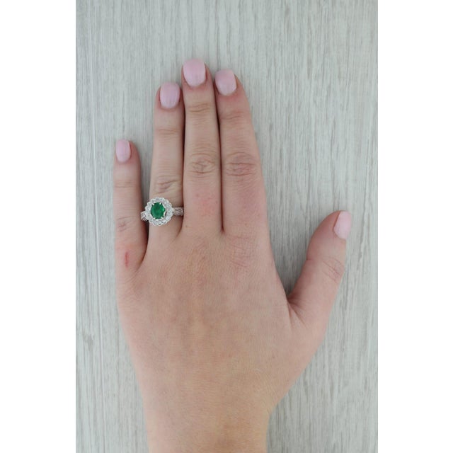 Gemstone Information: - Natural Emerald - Carats - 1.12ct (6.9 x 5.8 mm) Cut - Oval Brilliant Color - Green Treatment -...