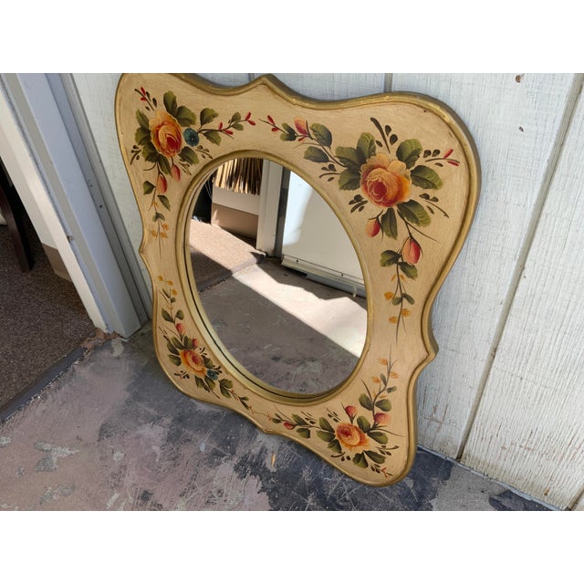 20th century wood mirror. Painted in a folk floral style flower motif. can be mounted vertically or horizontally.