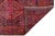 Hand-knotted Shiraz wool rug featuring three bold diamond medallions on a richly patterned red field. Accented with...