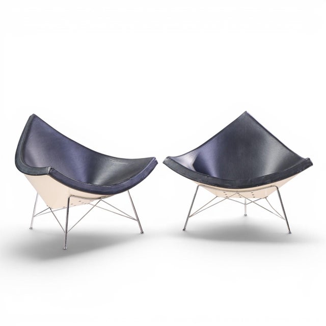 George Nelson for Vitra Mid Century Black Leather Coconut Chairs - Pair Each chair measures: 41.25 wide x 32 deep x 33...