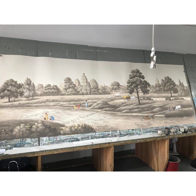 Beautiful hand‑painted panoramic mural capturing tranquil vintage Indian countryside scenery. This detailed artwork...