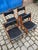 This set of four dining chairs combines classic Danish mid-century design with high-quality materials. The chairs are...