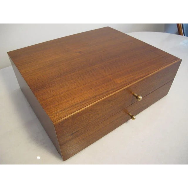 A beautiful miniature chest by Arthur Umanoff in figured walnut.