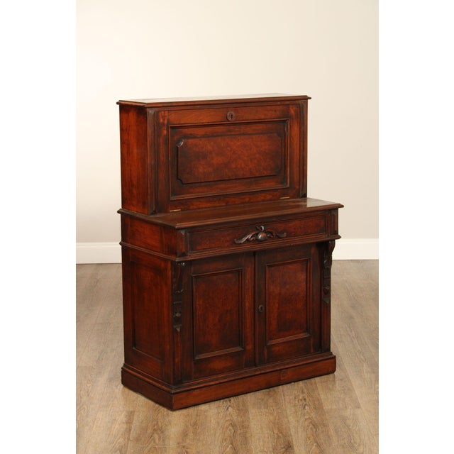 High Quality American Made Early Walnut Drop-Front Desk Featuring A Rectilinear Case With Paneled Fall-Front Writing...