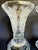 Here is a pair of vintage reversible glass vases and candleholders featuring a substantial faceted form with elegant...
